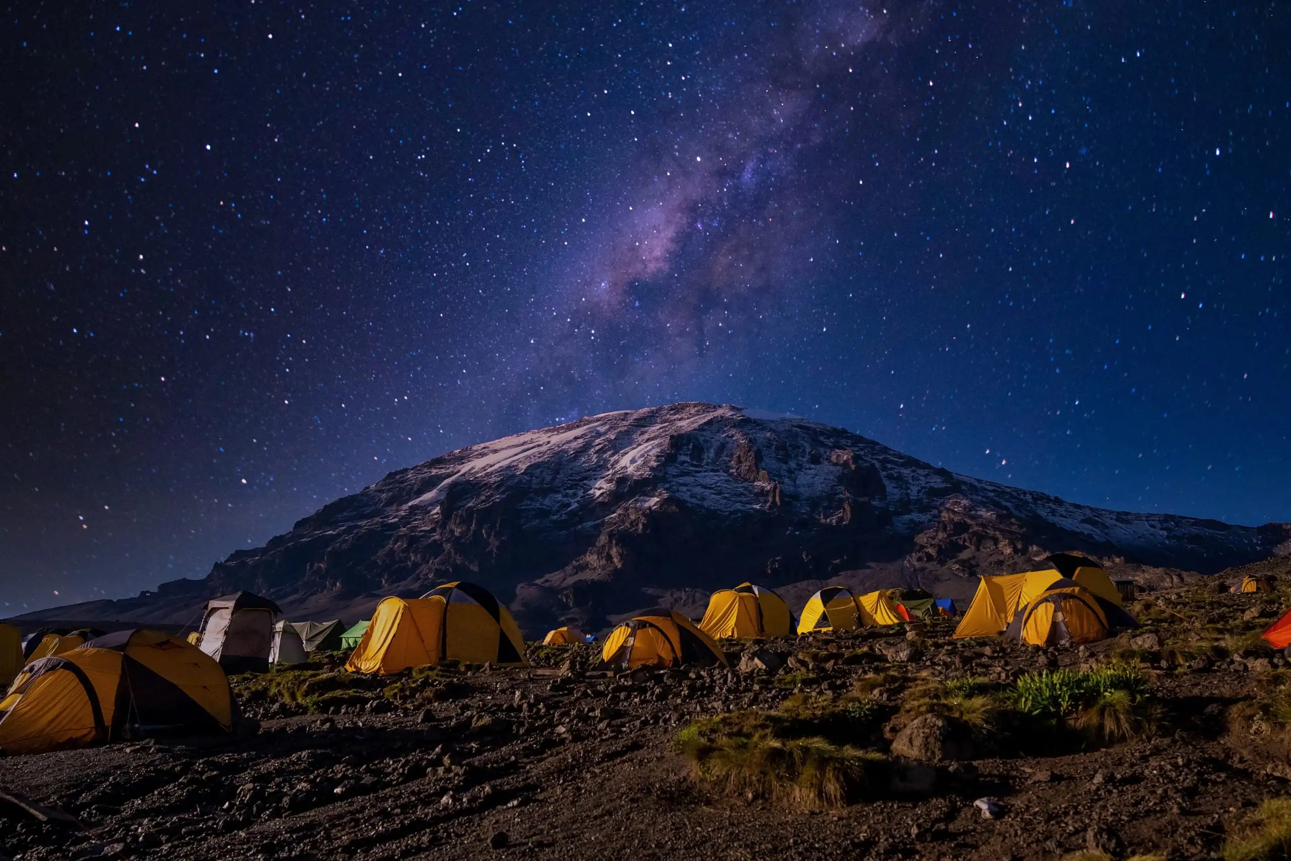 beautiful-scenery-yellow-tents-kilimanjaro-national-park-scaled